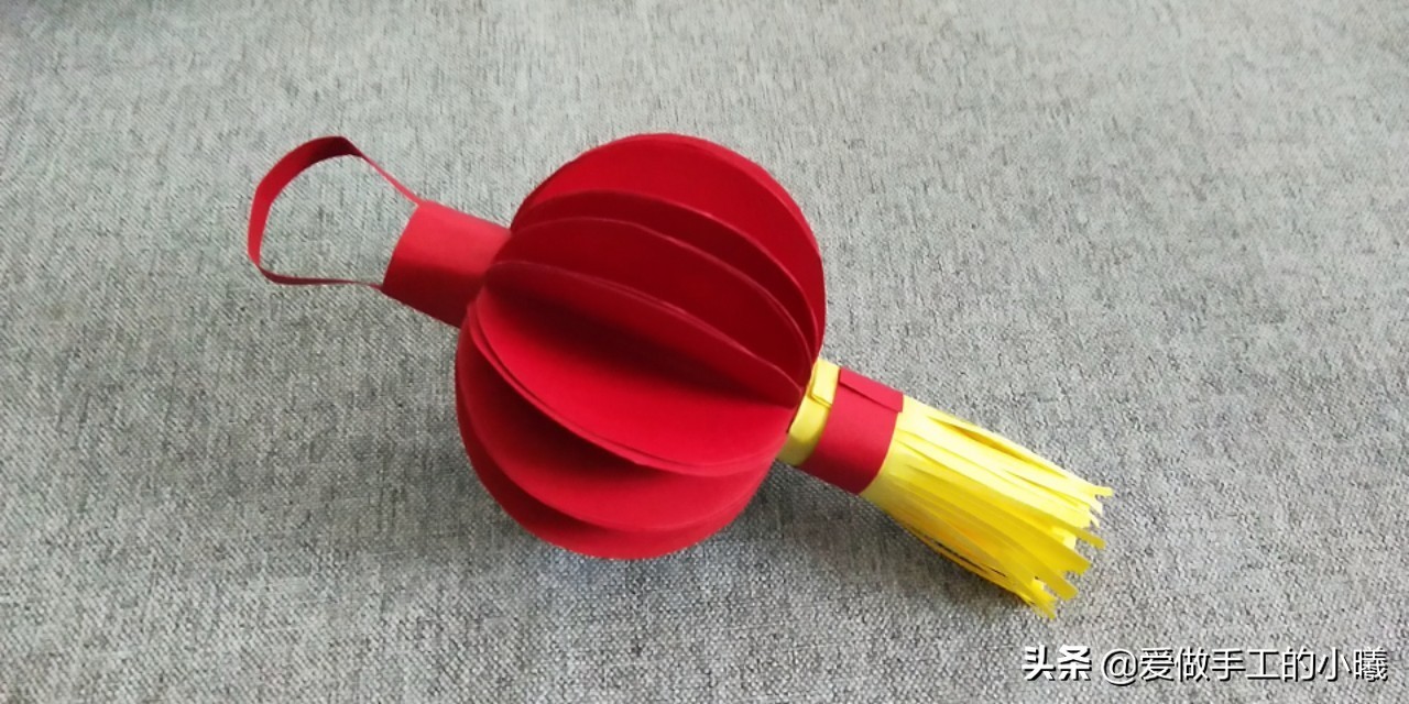 ​快过年了，用彩纸做个红红火火的灯笼吧，灯笼折纸图解 第18张