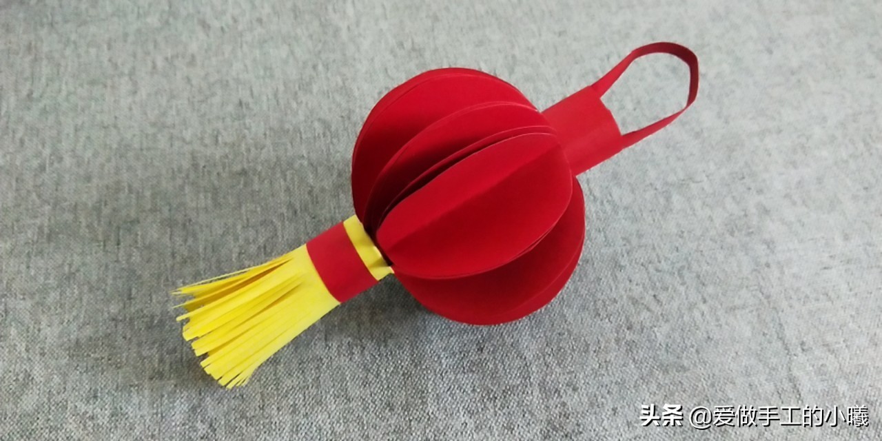 ​快过年了，用彩纸做个红红火火的灯笼吧，灯笼折纸图解 第3张